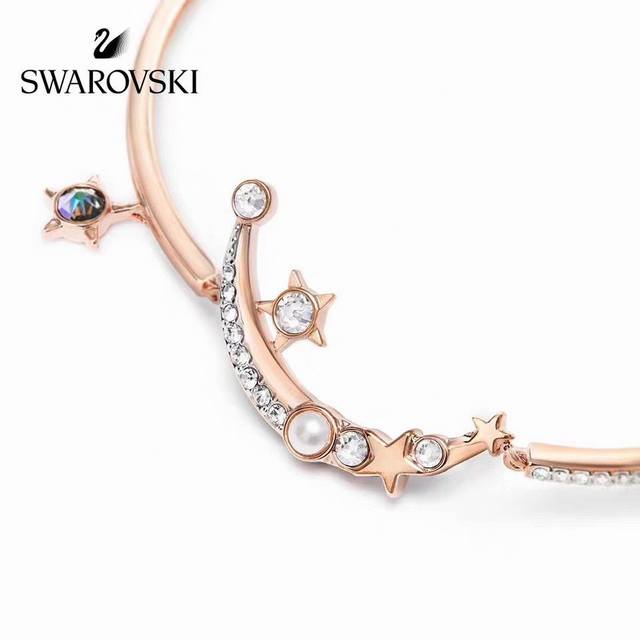 Swarovski 玫瑰金 星月蜜语幻彩手镯 这款镀玫瑰金色的星星装饰缀有闪亮迷人的深蓝色及白色swarovski仿水晶，是送给挚爱的上佳礼物。